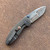 Krein Knives Custom Alpha Frame Lock Battle Blackened Checkered Titanium Handle Baker Forge DarkMai Damascus Compound Ground Blade