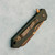Heretic Knives Jinn Manual Button Lock OD Green Handle Bronze Magnacut Blade H213-7A-GRN