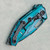 Heretic Knives Medusa Manual Recurve Turquoise Cel Shading H010-CS-TQ