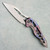 We Knife Co. Arrakis Frame Titanium Integral Handle w/ Flamed Titanium Inlays Hand Rubbed Satin Vanax Blade Limited Edition 906K