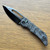 Heretic Knives Koschei Custom Crossbar Lock Marbled Carbon Fiber Handle DLC High Polish M390 Blade Abalone Button Inlay
