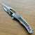 Heretic Knives Custom Wraith V4 Manual Bowie Vented Distressed Titanium Handle Hand Ground Cracked Ice M390 Blade Mother of Pearl Button Inlay