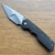 A2D Attn2Detail Mercantile Mark 3 Large Gen 4 Framelock Folder Countoured Double Divot Blackened Titanium Handle Stonewash/Satin Hissatsu Compound Grind Magnacut Blade