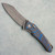 G&G Hawk Talon Hawk Lock w/Toggle Detent Titanium Handle w/ CarboTi Linear Blue Inlays Stonewash Blade