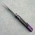 Chaves Knives Jake McCoy Omega Street Blue Label Black Knurled Aluminum Handles Stonewash Blade Purple Hardware