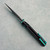 Chaves Knives Jake McCoy Omega Street Blue Label Black Knurled Aluminum Handles Black PVD Blade Green Hardware