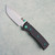 Chaves Knives Blue Label Redencion Street Liner Lock Black Knurled Aluminum Handles Stonewash 154CM Drop Point Blade Green Hardware