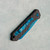 Heretic Knives Jinn Auto Carbon Fiber Handle Metallic Teal MagnaCut Blade H113-MT-CF