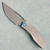 Prince Customs Protean Frame Lock Ripple Titanium Handle MagnaCut Drop Point Blade