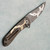 DireWare Tailwhip V2 Frame Lock Flipper Two Tone Titanium Handle Two Tone 20CV Blade