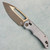 Heretic Knives Koschei Crossbar Lock Blizzardworn Aluminum Handles Bronze MagnaCut Blade H061-7A-BLZ