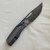 Prince Customs Protean Frame Lock Putter Skelly Blue/Satin Titanium Handle Vegas Forge Ladder San Mai Damascus Drop Point Blade