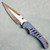 Scorpion 6 Sinnsyk Frame Lock Sculpted Blue Titanium Handle Two Tone Heat Colored Nitro V Blade (Consignment)
