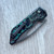 Heretic Knives Koschei Custom Crossbar Lock Antiqued Copper Handle Vegas Forge Damascus Blade Rock Ground DLC Clip Clip Side