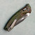 Microtech Amphibian Mini RAM-LOK S/E Frag Outbreak Aluminum Standard 137MRL-1FROBS Clip Side