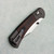Buck 112 Ranger Crossbar Lock Blasted Aluminum Handles w/ Macassar Ebony Wood Inlays Satin MagnaCut Blade 14517 Clip Side