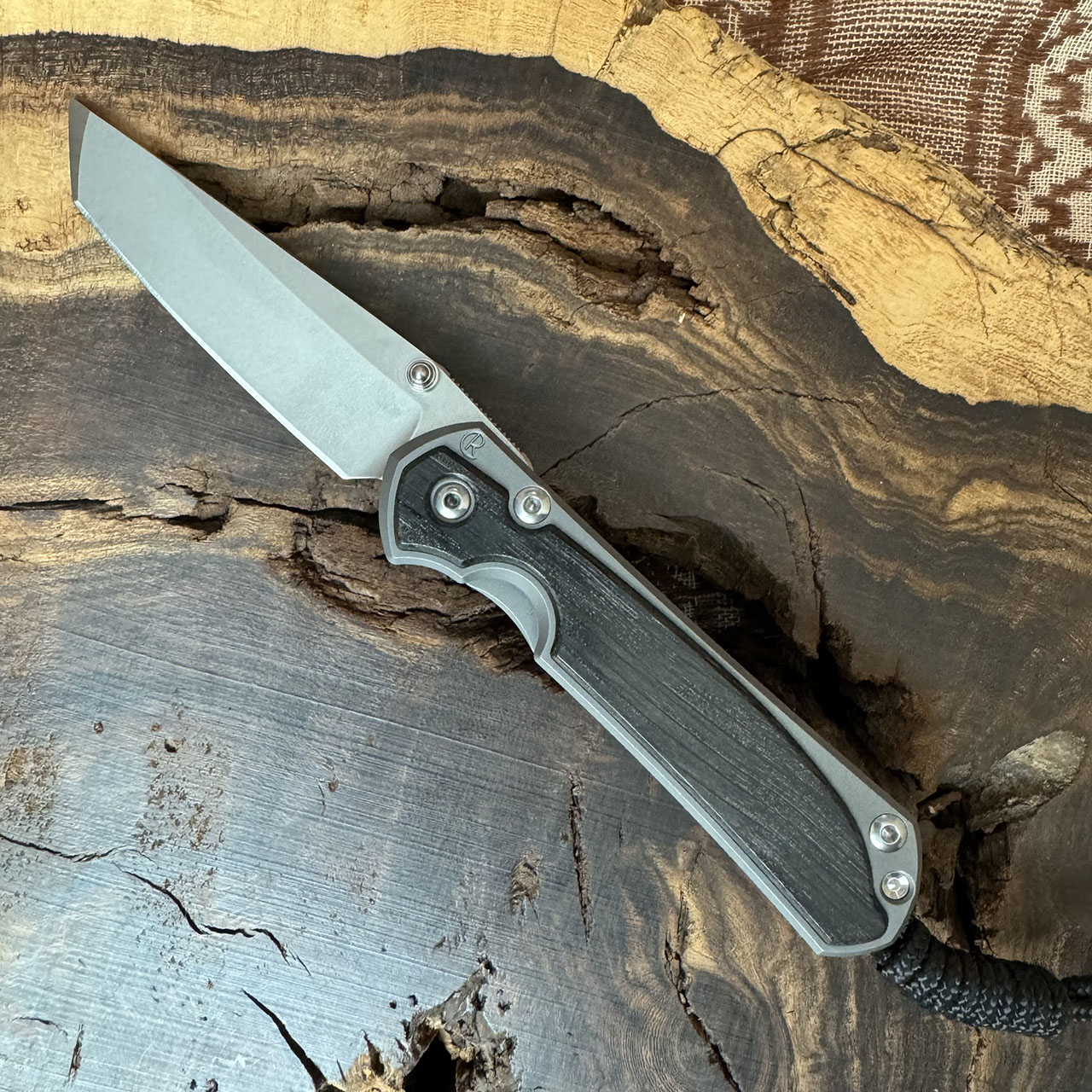 https://cdn11.bigcommerce.com/s-1tyihs272l/images/stencil/original/products/9671/22373/ChrisReeveKnives-SmallSebenza31-Frame-TiBogOak-Stonewashed__57319.1703175970.jpg