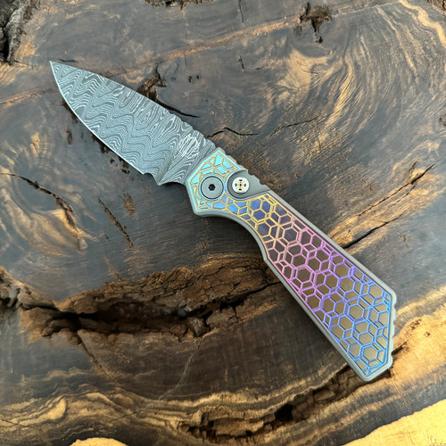 Pro-Tech Strider PT+ Auto Chipped Metal Unique Anodized Titanium