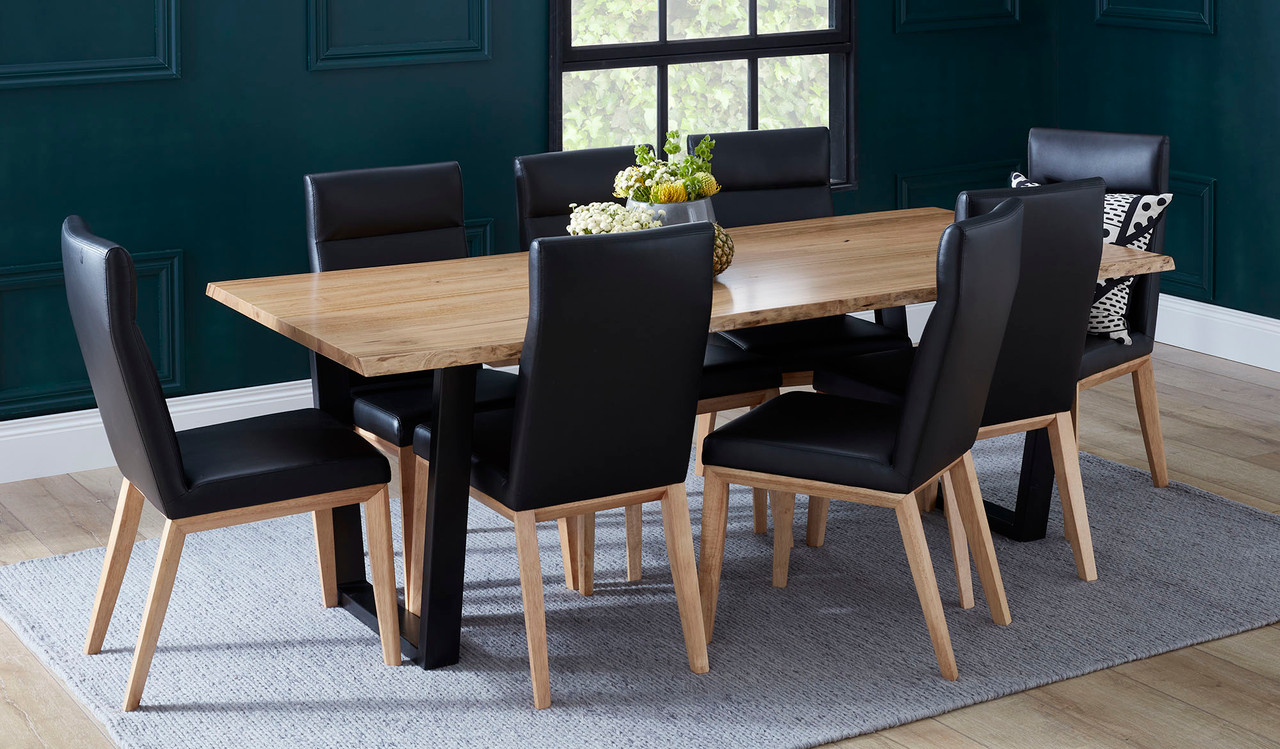 Archie dining table in solid messmate timber with live edge detail and black metal legs, modern timber dining table