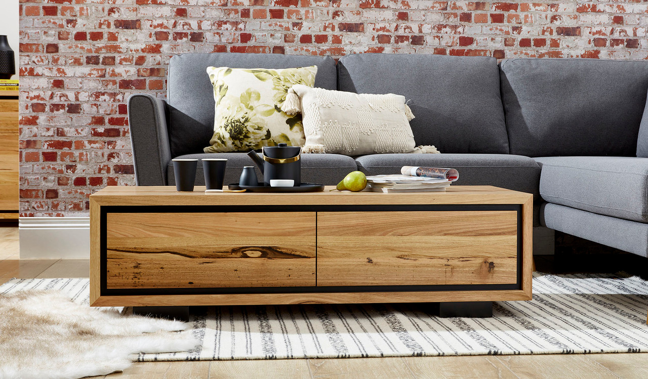 Eden coffee table in sustainable Australian messmate timber with unique knots, sleek modern edges, and black detailing