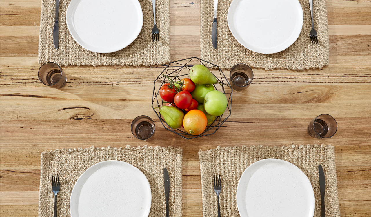 Eden dining table in sustainable Australian messmate timber with sleek modern edges and black detailing, contemporary timber dining table