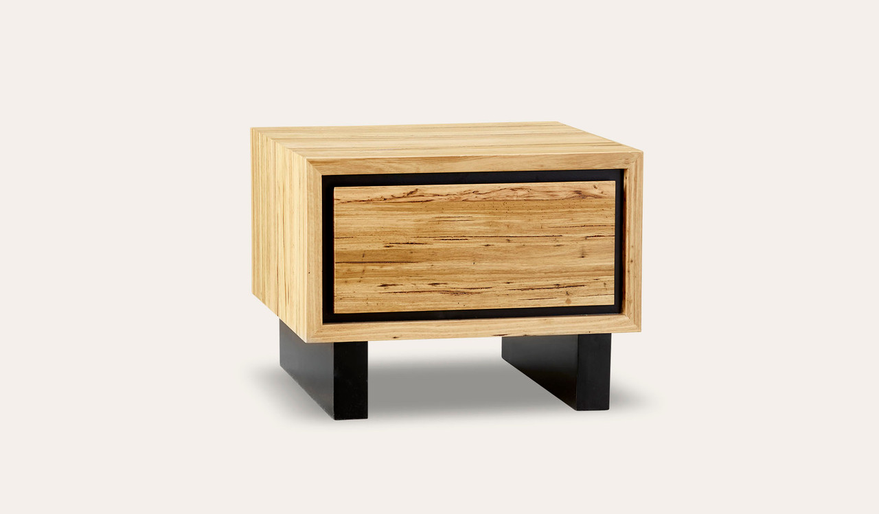 Eden lamp table in sustainable Australian messmate timber with sleek modern edges and black detailing, contemporary timber side table