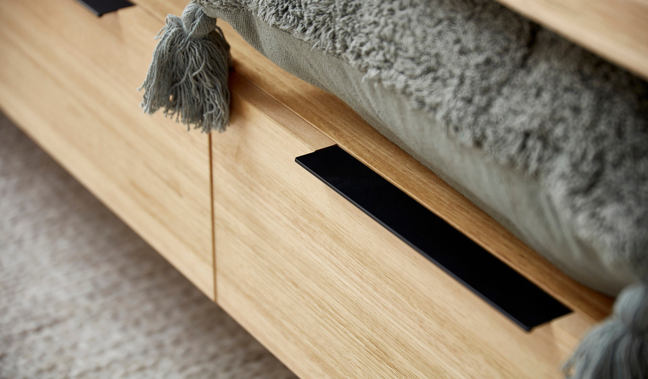 Braxton entertainment unit in solid messmate timber with black metal legs and multiple storage compartments