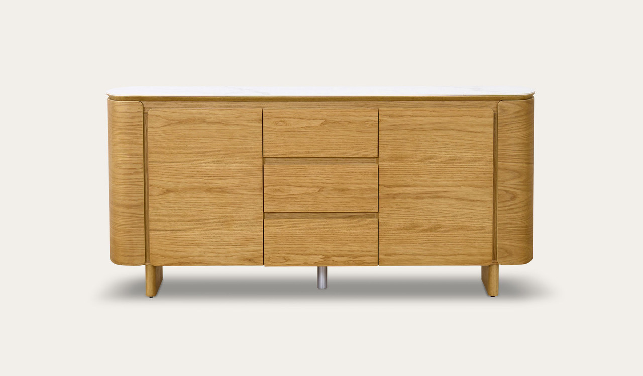 Cara buffet with matte white carrara-look ceramic top, natural oak finish, three soft-close drawers and two doors with internal shelf, 1600mm wide