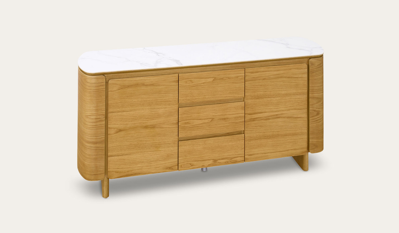 Cara buffet with matte white carrara-look ceramic top, natural oak finish, three soft-close drawers and two doors with internal shelf, 1600mm wide