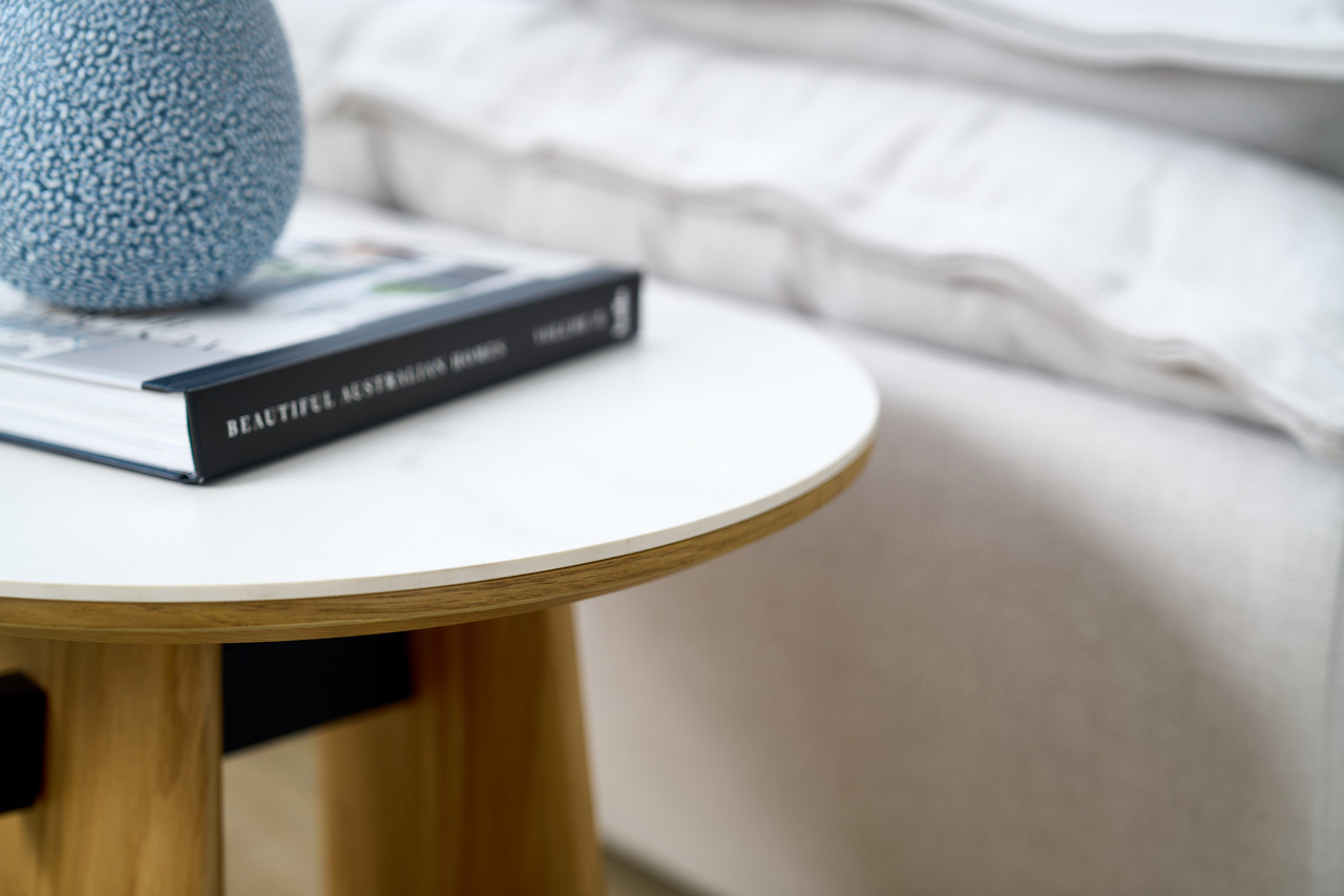 Cara lamp table with matte white carrara-look ceramic top and natural oak finish, modern round side table
