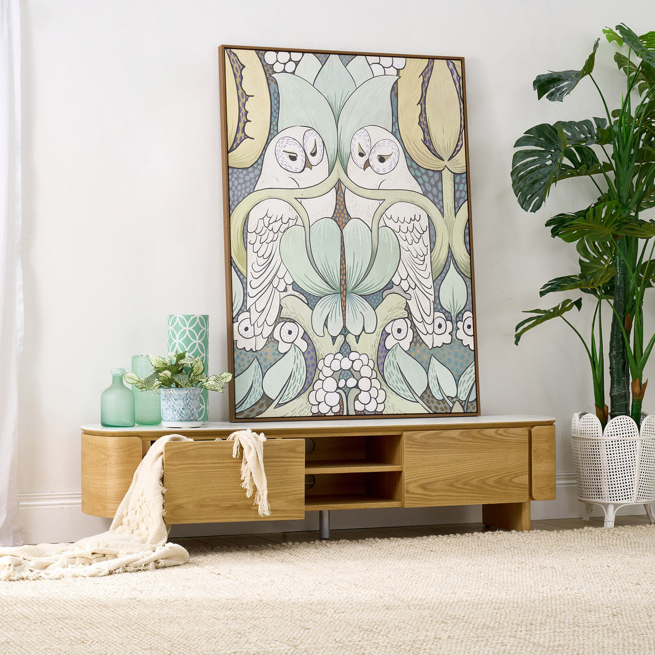 Cara entertainment unit with matte white carrara-look ceramic top and natural oak finish, two-door TV cabinet with open shelving