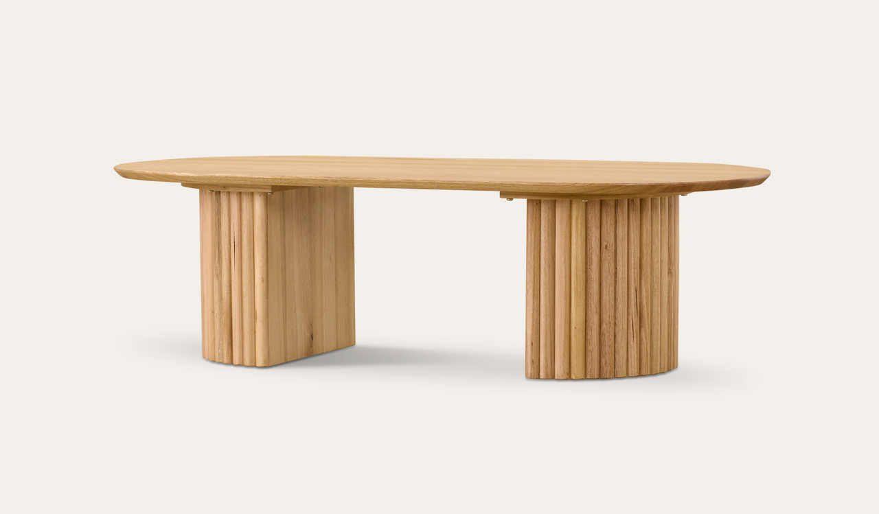 Carrera coffee table in Tasmanian oak timber with fluted detailing, curved silhouette, and natural water-based finish, modern timber coffee table