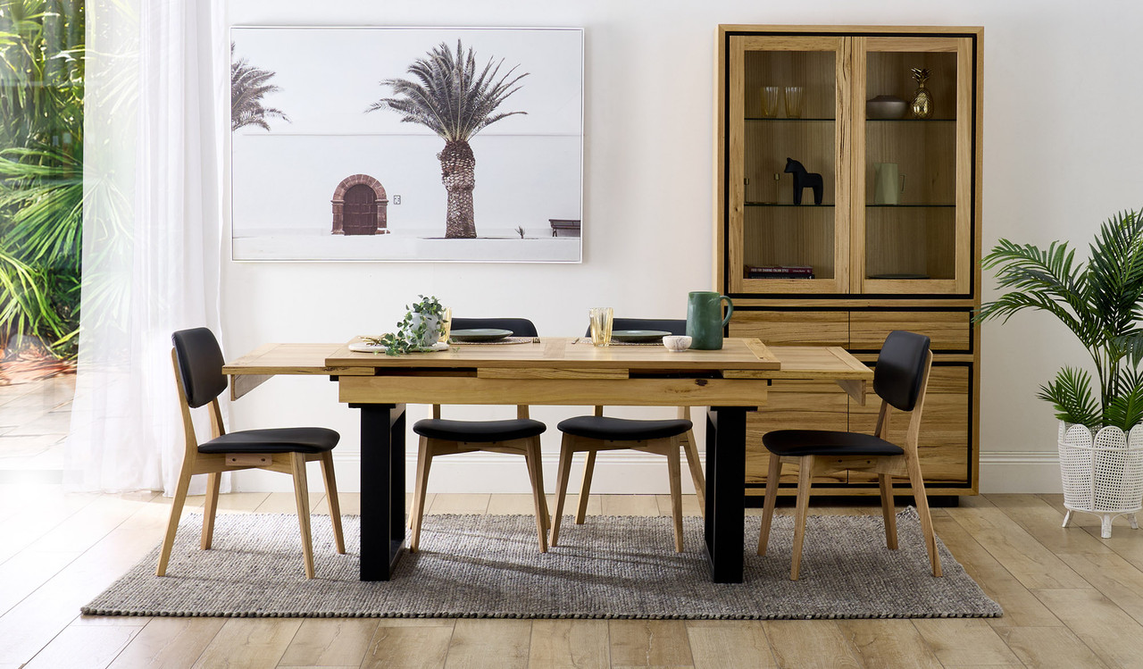 Eden extension dining table in sustainable Australian messmate timber with sleek modern edges, black detailing, and extendable design, contemporary timber dining table