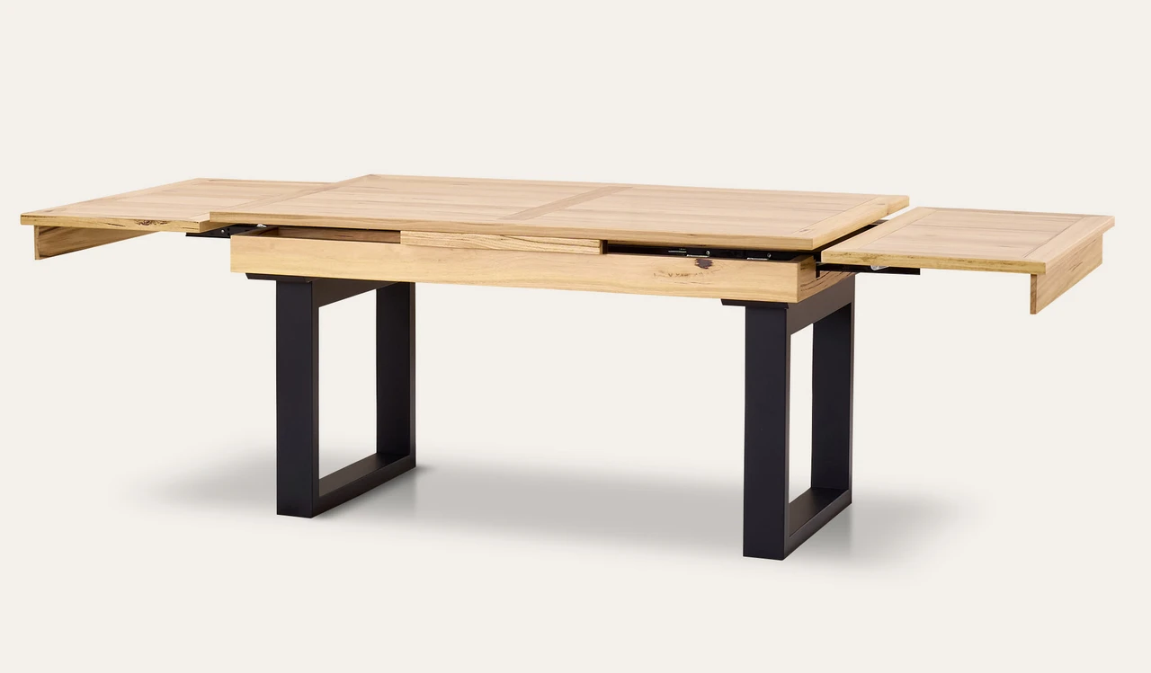 Eden extension dining table in sustainable Australian messmate timber with sleek modern edges, black detailing, and extendable design, contemporary timber dining table