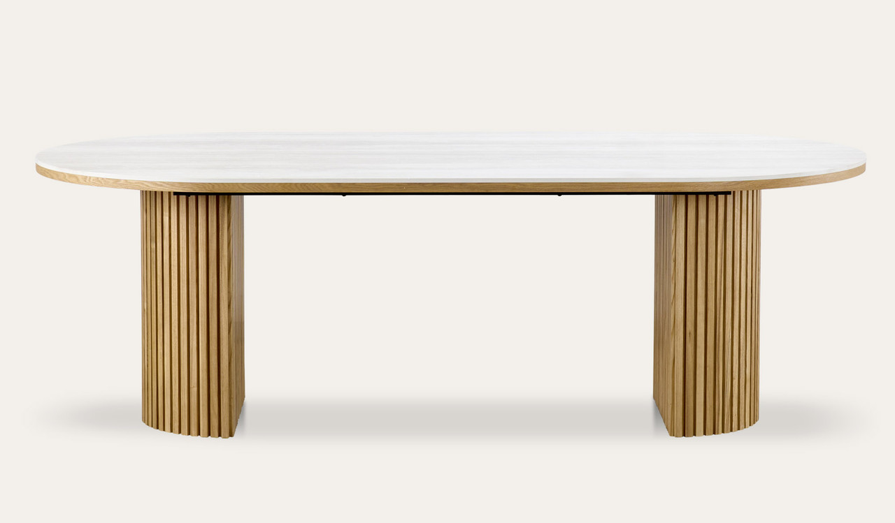 Eclipse dining table with travertine ceramic top, ash mountain grain detail, and half column slatted base in matte black or natural finish