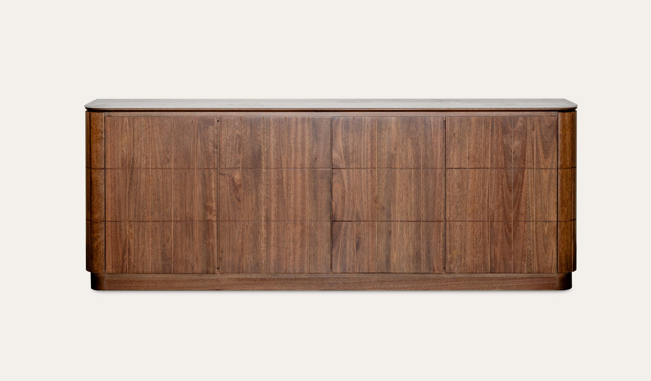 Montera buffet with a glossy marble-look sintered stone top and umber timber cabinetry, combining statement design with practical dining storage.