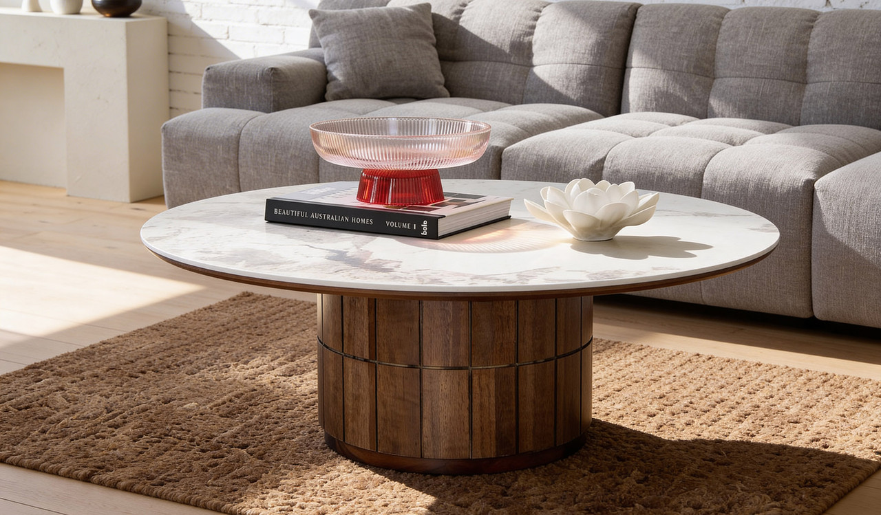 Montera coffee table with glossy marble-look sintered stone top and umber timber base, designed to bring modern texture and elegance to living rooms.