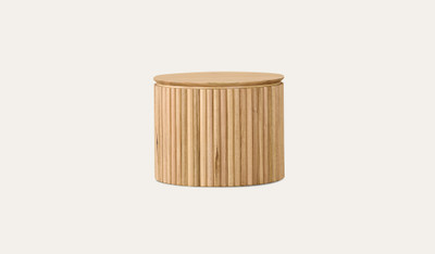 Carrera lamp table in Tasmanian oak timber with fluted detailing, curved design, and natural water-based finish, modern timber side table