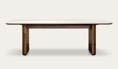 Montera dining table featuring a glossy marble-look sintered stone top with warm umber timber base, creating a bold and refined centrepiece for modern dining spaces.