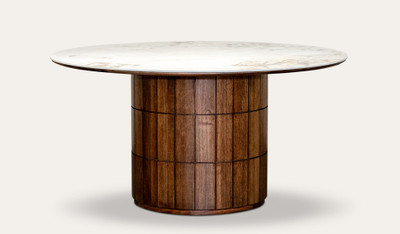 Montera round dining table featuring a glossy marble-look sintered stone top with warm umber timber base, creating a bold and refined centrepiece for modern dining spaces.