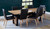 Archie dining table in solid messmate timber with live edge detail and black metal legs, modern timber dining table