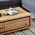Eden coffee table in sustainable Australian messmate timber with unique knots, sleek modern edges, and black detailing