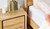 Eden bedside table in sustainable Australian messmate timber with sleek modern edges and black detailing, contemporary timber bedside table