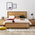 Eden bed in sustainable Australian messmate timber with natural knots, sleek edges, and black detailing, modern timber bed frame