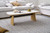 Cara coffee table with matte white carrara-look ceramic top and natural oak finish, contemporary round coffee table