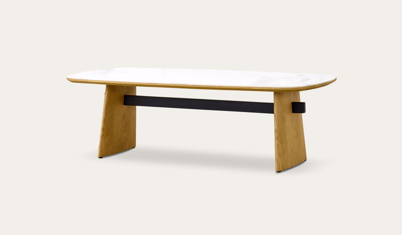 Cara coffee table with matte white carrara-look ceramic top and natural oak finish, contemporary round coffee table
