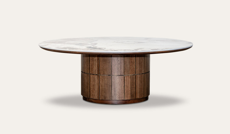 Montera coffee table with glossy marble-look sintered stone top and umber timber base, designed to bring modern texture and elegance to living rooms.