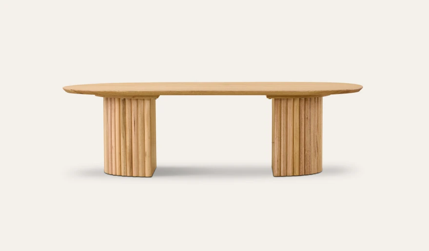 Carrera coffee table in Tasmanian oak timber with fluted detailing, curved silhouette, and natural water-based finish, modern timber coffee table