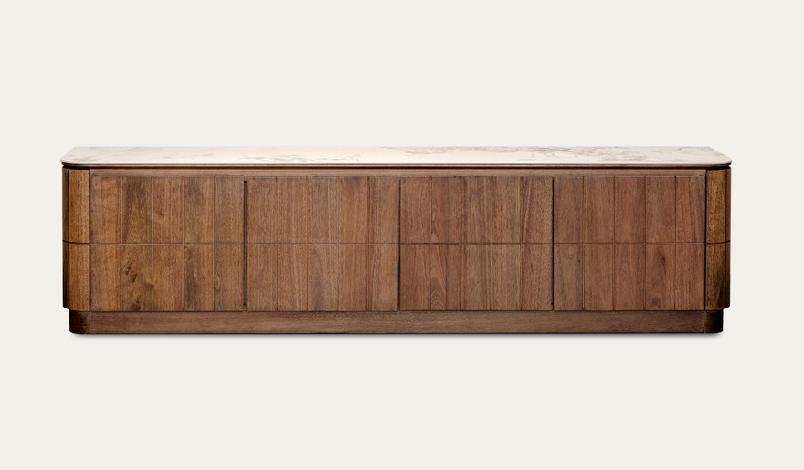 Montera buffet with a glossy marble-look sintered stone top and umber timber cabinetry, combining statement design with practical dining storage.