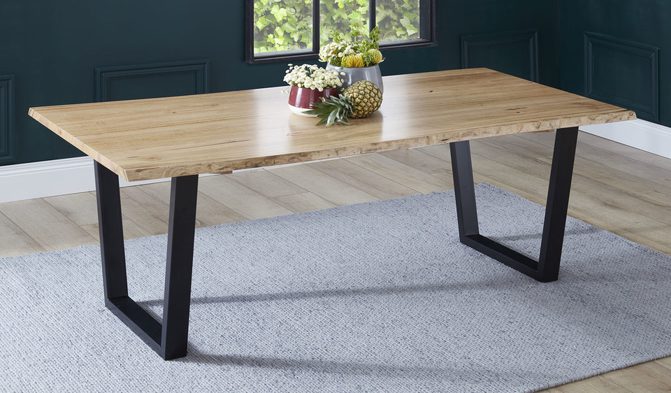 Archie dining table in solid messmate timber with live edge detail and black metal legs, modern timber dining table